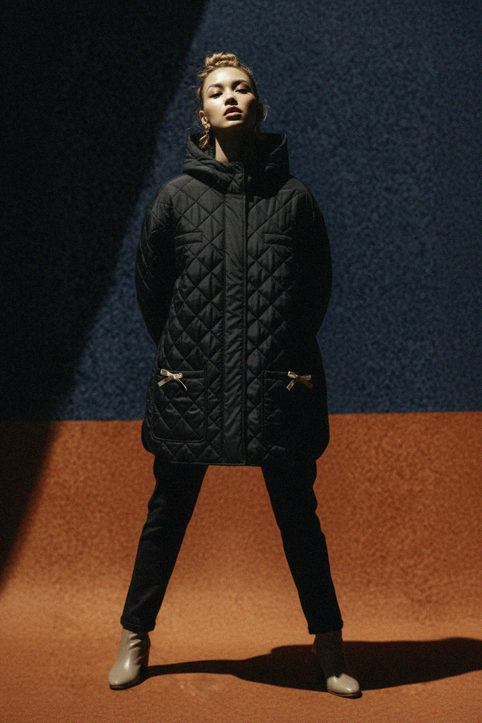 Black Quilted Hooded Jacket with Bow Details photo 2