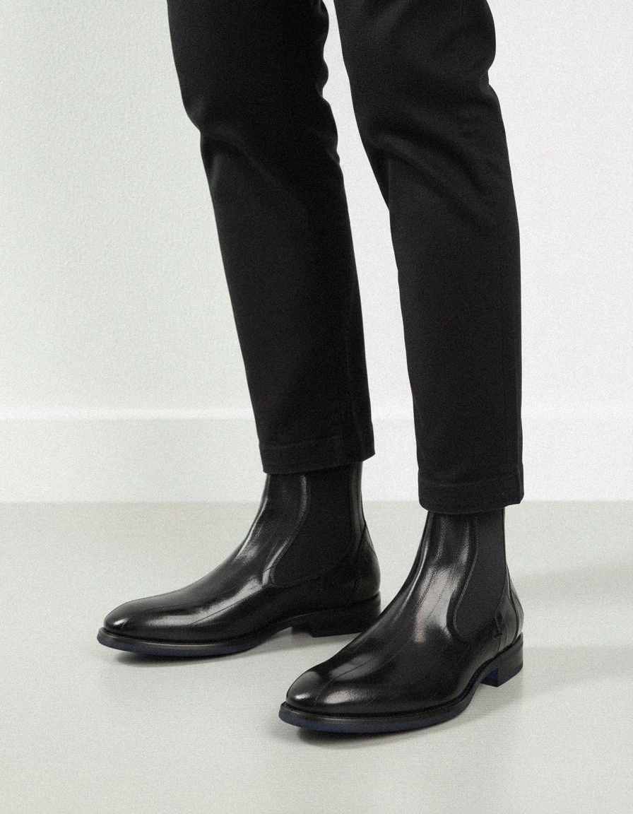 Shiny Black Chelsea Boots with Blue Sole Accent photo 2