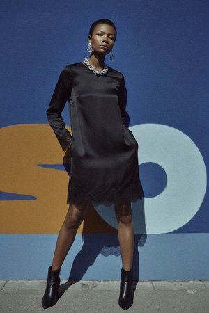 Elegant Black Mini Dress with Lace Trim & Long Sleeves