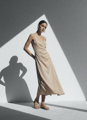 Elegant Beige Sleeveless Midi Dress