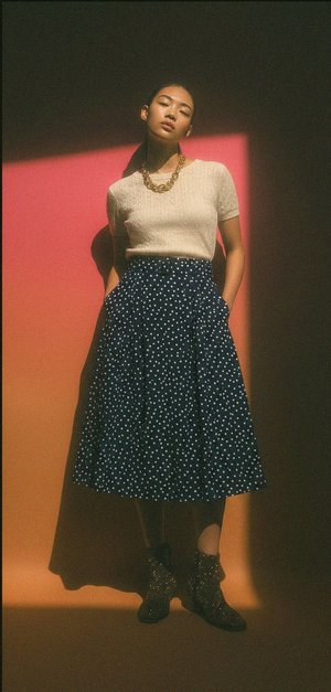 Chic Polka Dot Midi Skirt with Belt Detail
