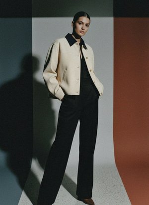 Cream Ribbed Jacket with Contrast Blue Collar